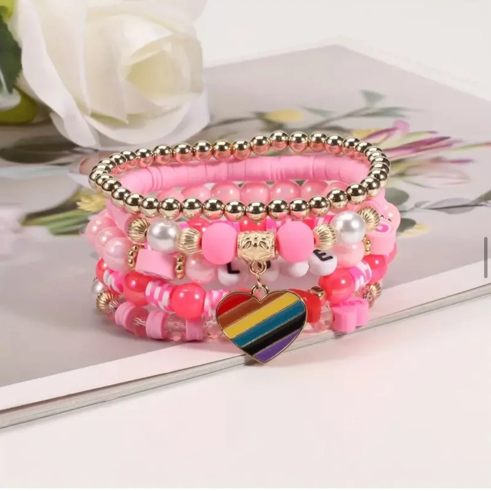 NWT! Fashion Jewelry 5 pink and gold beaded stackable stretch bracelets